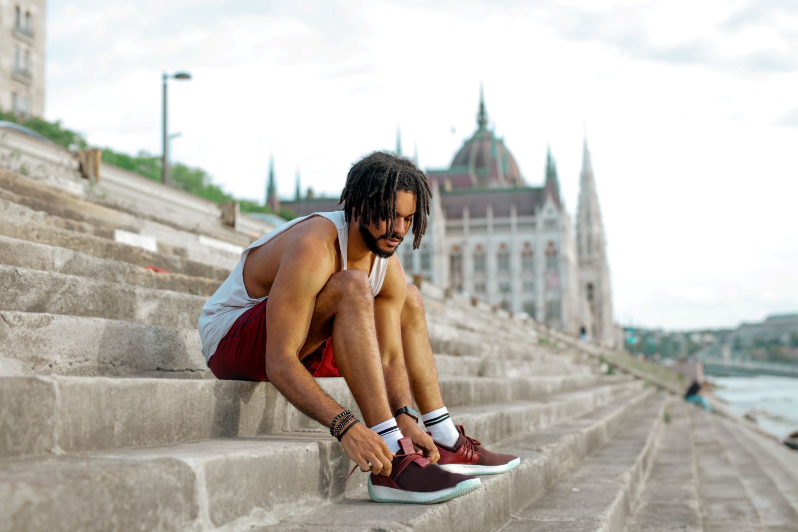 man stretching before run