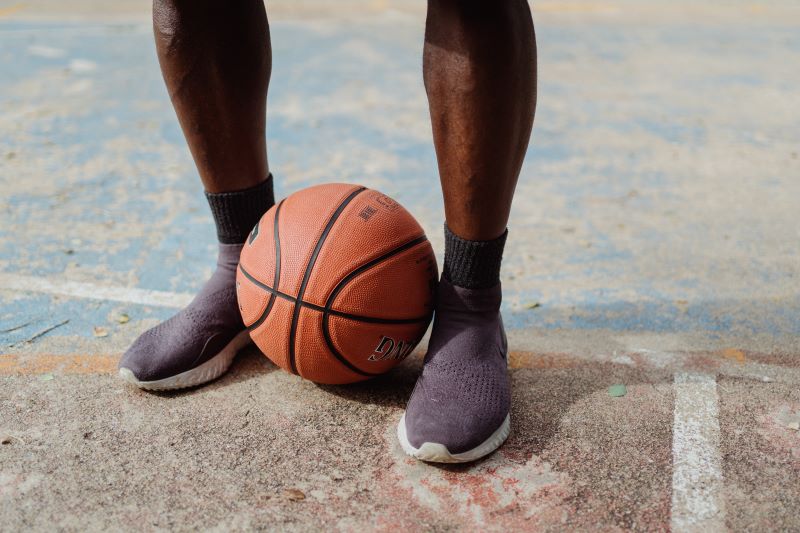 basketball between two legs